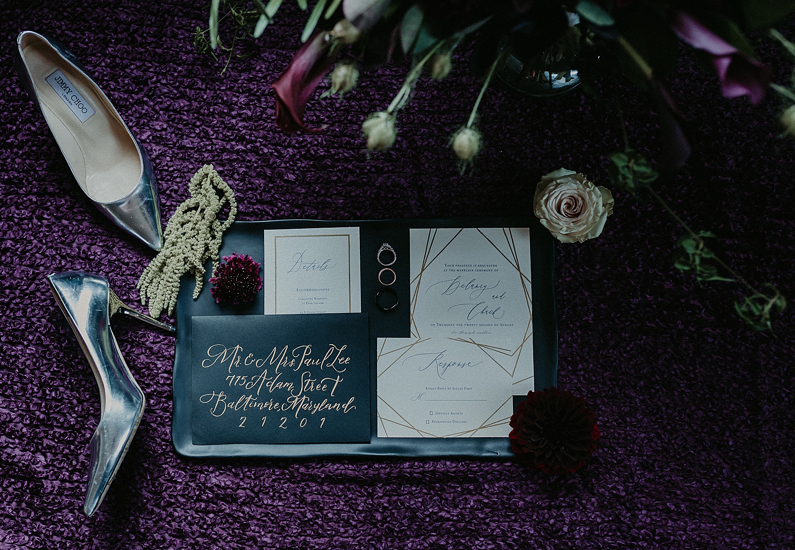 Wedding invitation styled with flowers and accents
