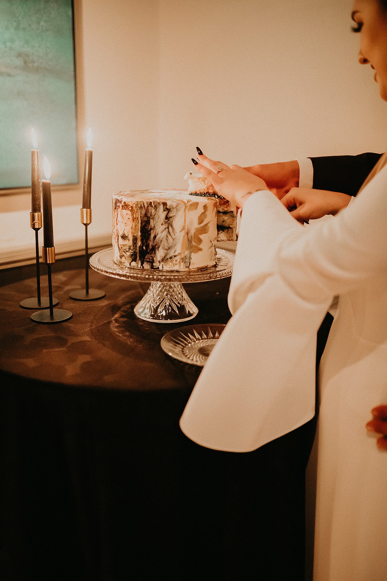 Bride and Groom cutting their wedding cake