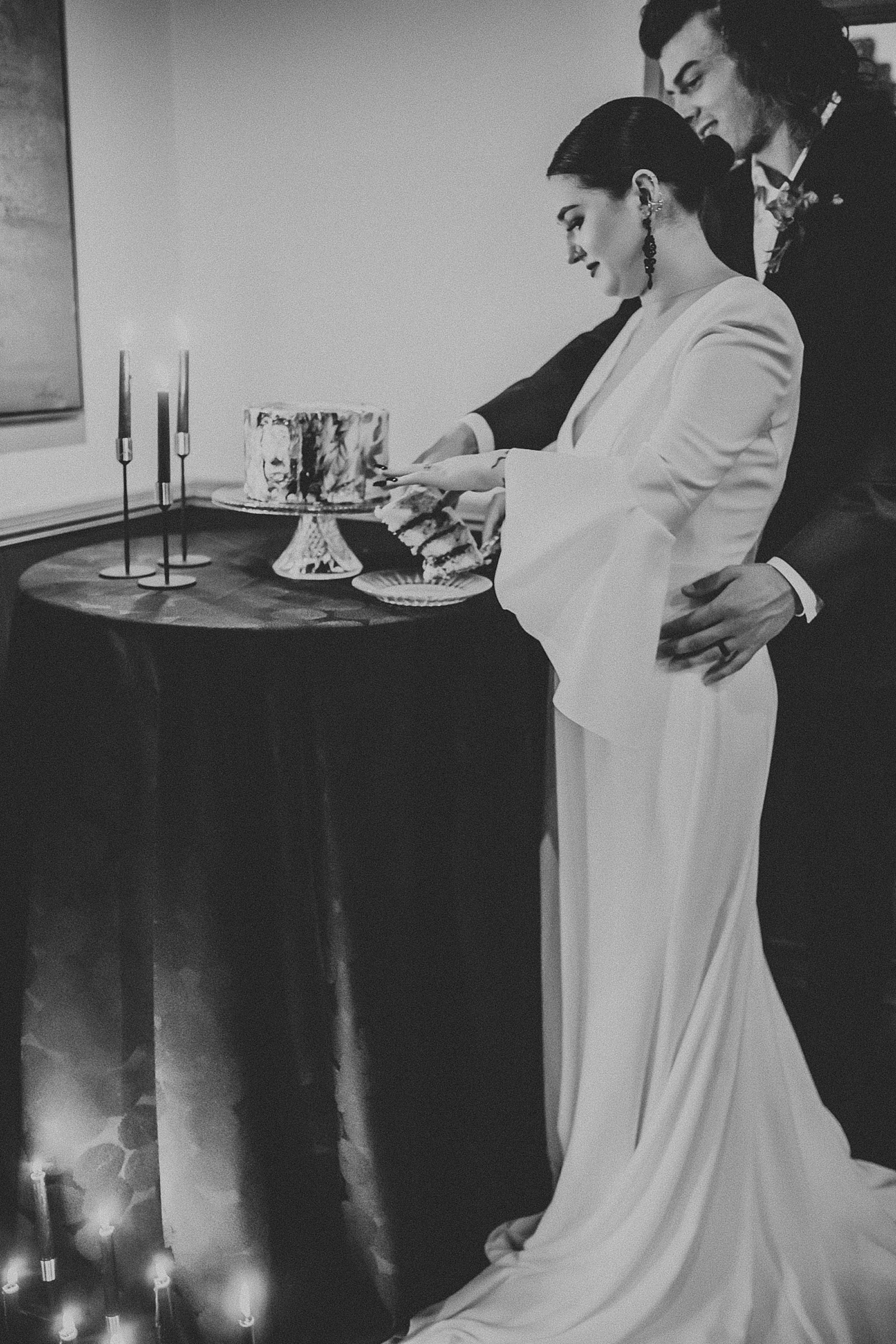 Bride and Groom cutting their wedding cake
