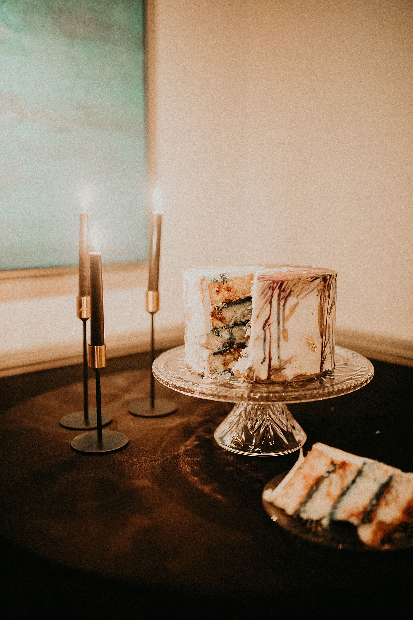 Bride and Groom cutting their wedding cake