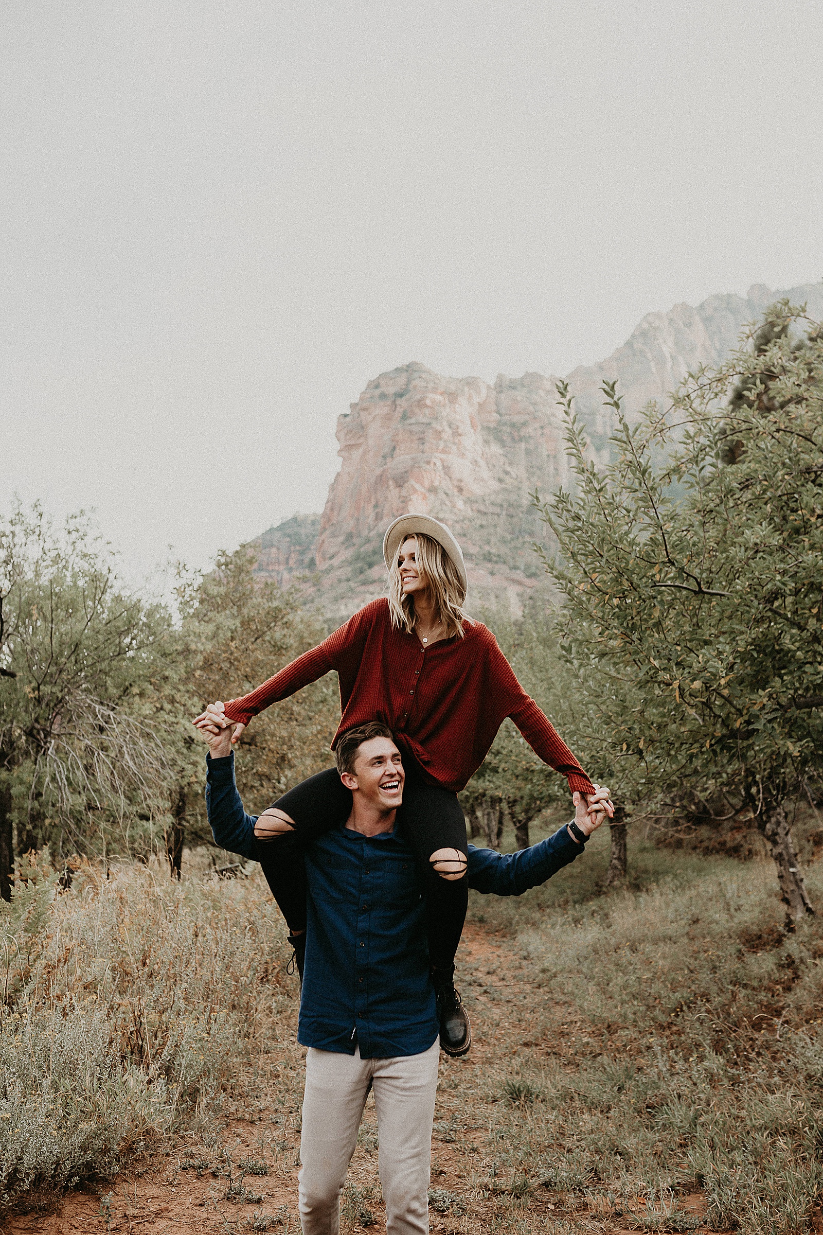 Fall time engagement session in wildflower garden at Slide Rock State Park in Sedona Arizona